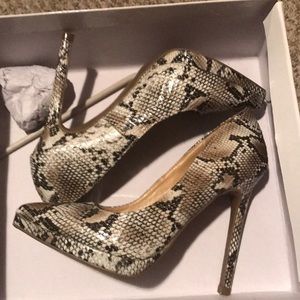Snakeskin pumps